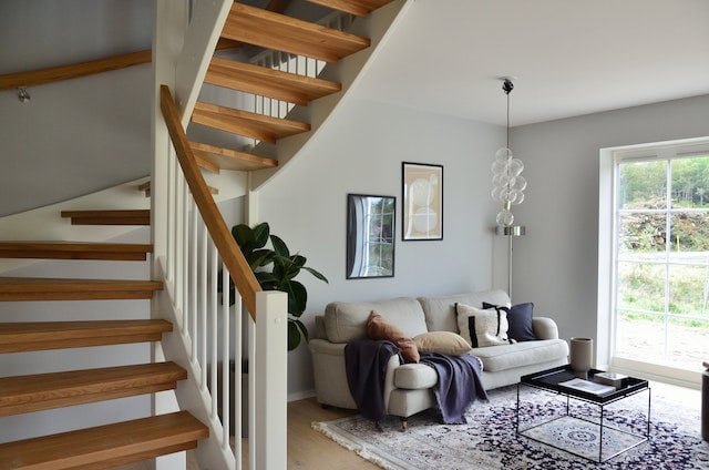 living room with. couch and staircase