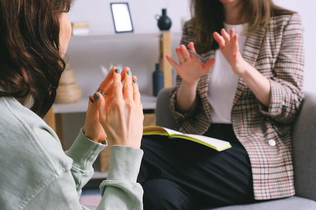 person interviewing other person