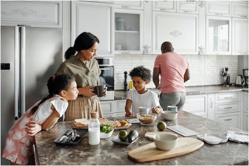 family-cooking-in-kitchen-of-rental-property